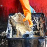 Grease,Traps,From,Dirty,Debris,Being,Cleaned,With,A,Scoop