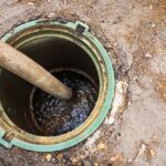 Clogged,Septic,Tank.,Emptying,The,Septic,Tank.,Pipe,In,The