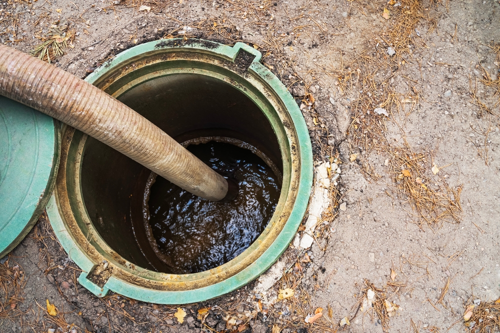 Clogged,Septic,Tank.,Emptying,The,Septic,Tank.,Pipe,In,The