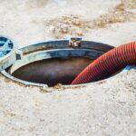 Pipe,In,The,Drainage,Pit.,Pumping,Out,Sewage,From,A