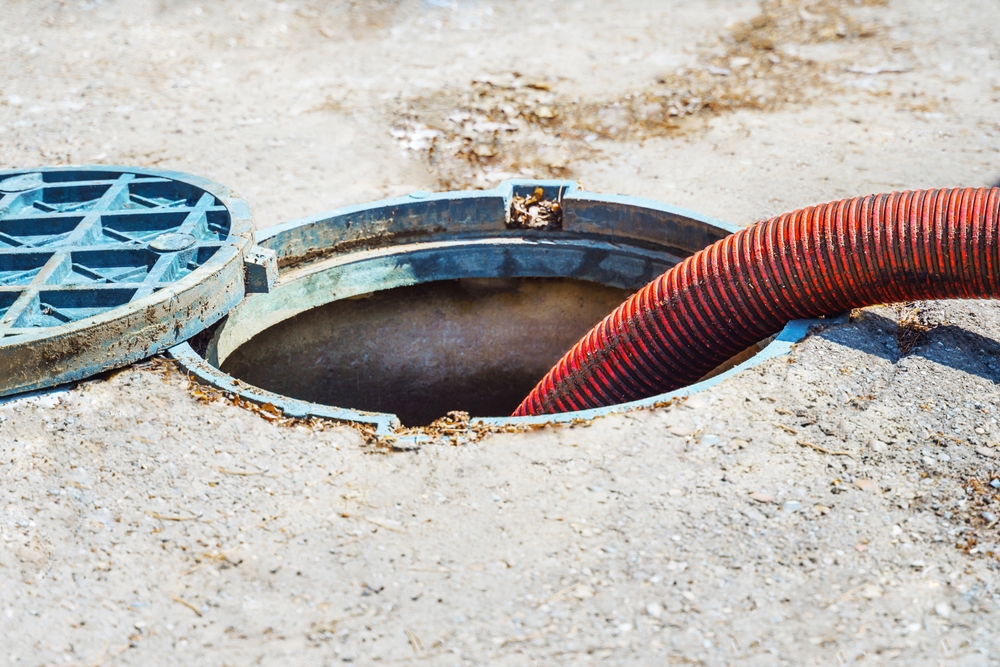 Pipe,In,The,Drainage,Pit.,Pumping,Out,Sewage,From,A