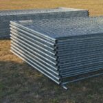 Stacked,Sections,Of,Metal,Mesh,Wire,Fence,Ready,For,Building